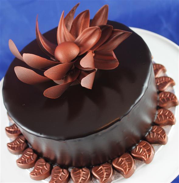 Decadent rich chocolate cake layered with smooth ganache