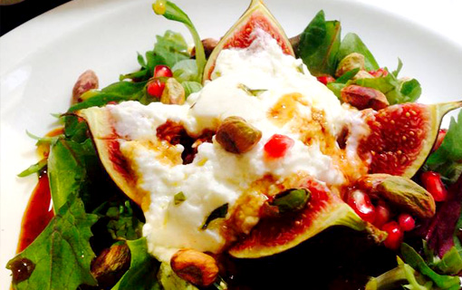 Roasted fig and goat's curd salad with toasted pistachios, pomegranate and orange - yum!